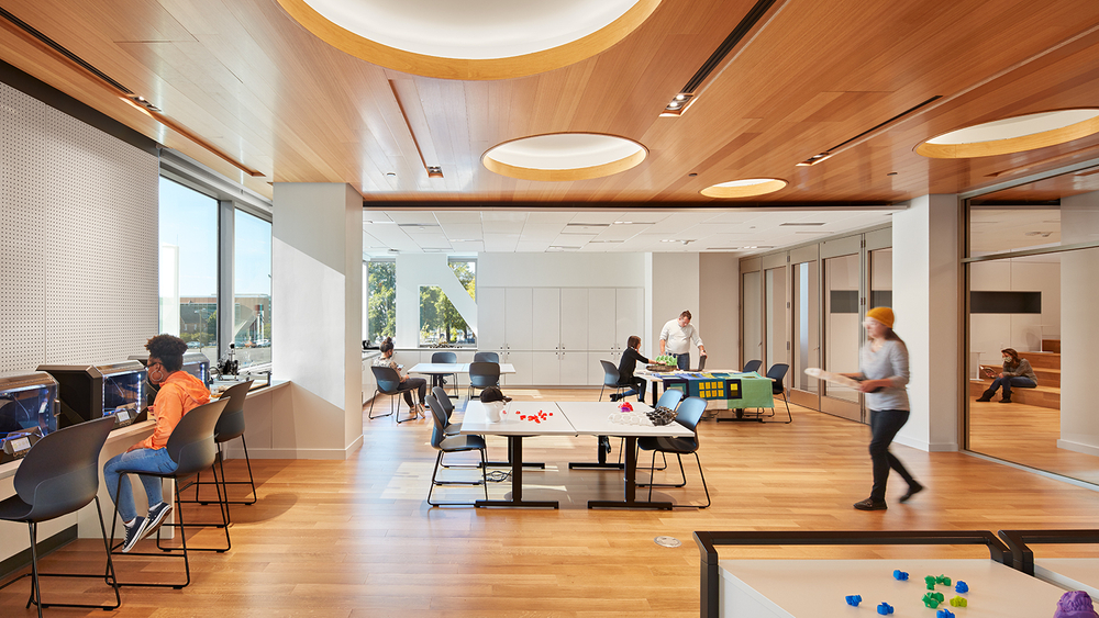 An interior of Durham Library, with desks, computers, and Nydree Rift and Quartered White Oak Natural floorboards.